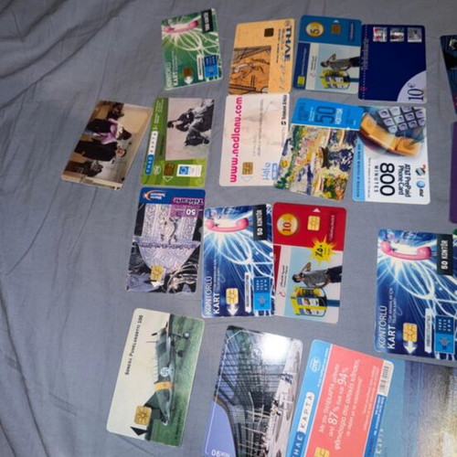 Phone cards and time cards used, collection of 29 from various countries