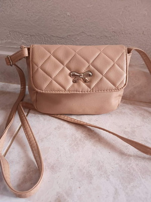 Quilted beige crossbody bag with metal bow new