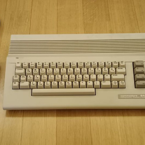 Commodore 64C used with original power supply, cassette player, and manuals