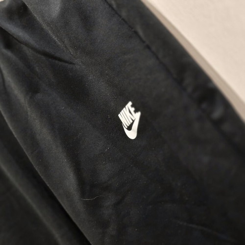 Nike kids' black tracksuit pants like new for ages 9-12