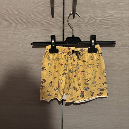 Yellow shorts pyjamas with playful all-over print like new