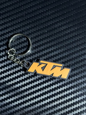 KTM keychain new, black and orange