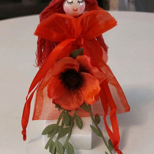 Handmade decorative poppy figure in marble like new