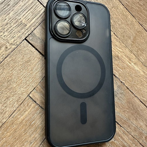 iPhone 14 Pro case with broken right lens protector