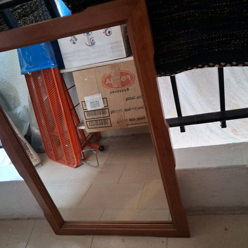 Mirror with wooden frame in very good condition