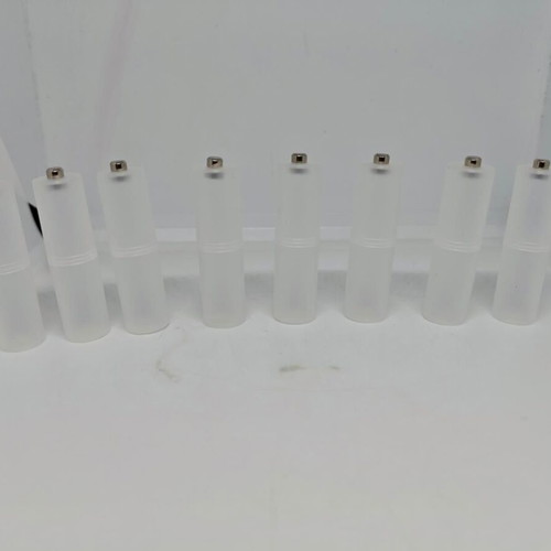 Battery adapters AA to C set of 8, like new, plastic transparent