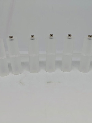 Battery adapters AA to C set of 8, like new, plastic transparent