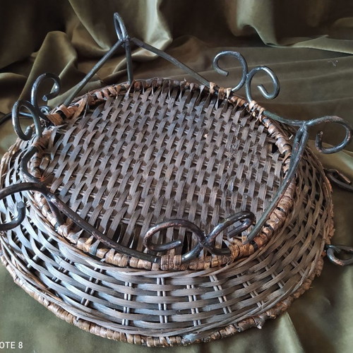 Woven rattan tray used with metal frame