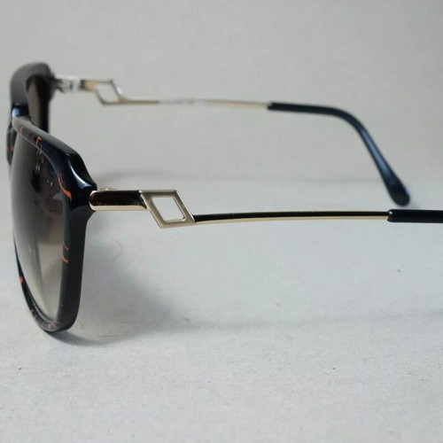Italian Luxottica 8589 sunglasses used, black and brown