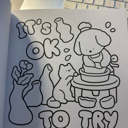 Cozy Vibes colouring book with 45 handwritten pages