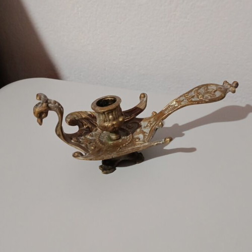 Bronze candlestick used, baroque style with embossed decoration