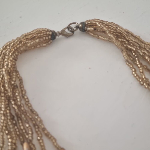 Necklace used, gold color