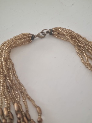 Necklace used, gold color