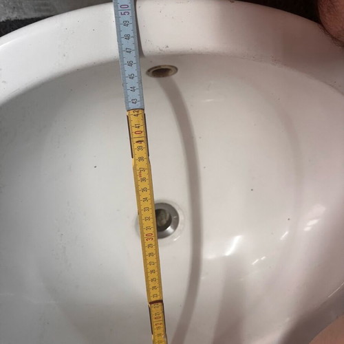 Bathroom sink used with faucet