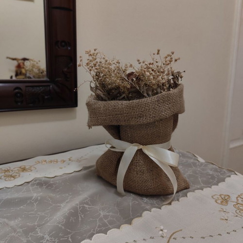Decorative sack with dried flowers like new