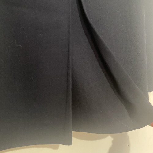 High-waisted women's office skirt with decorative buttons, pleats, like new, blue
