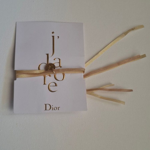 Dior bracelet with charm and adjustable ribbon new, gold and beige