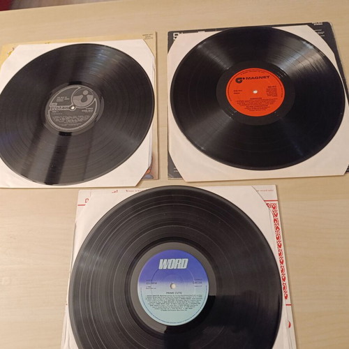 Collection of 3 vinyl records like new