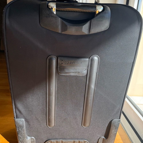 Delsey Black Medium Suitcase used with wheels