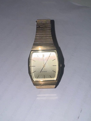 Orient VX watch used, gold color in excellent condition
