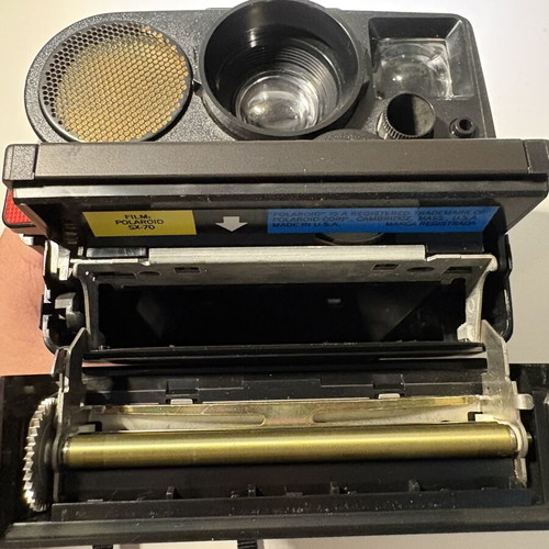 Polaroid Sonar AF 5000 instant camera with 8-frame film pack