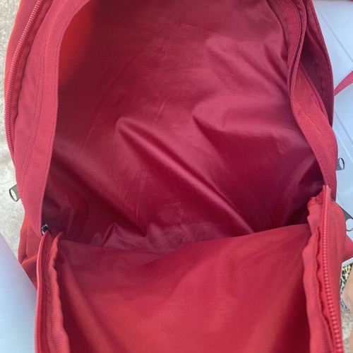Champion backpack red, like new, large capacity with multiple compartments
