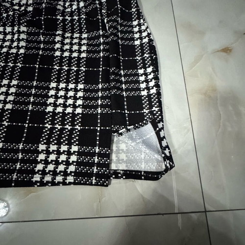 Women's skirt new, above the knee, black and white, XXL