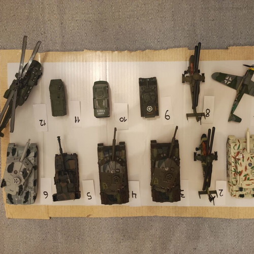 Metal military model set used, 23 pieces including helicopters and planes