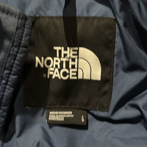 The North Face puffer jacket used, size L, blue
