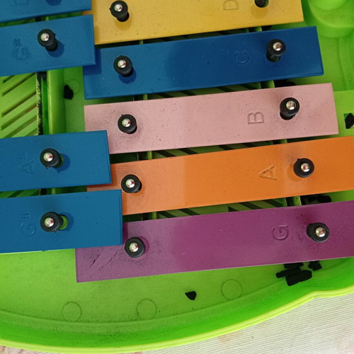 Metallophone used children's musical instrument in case