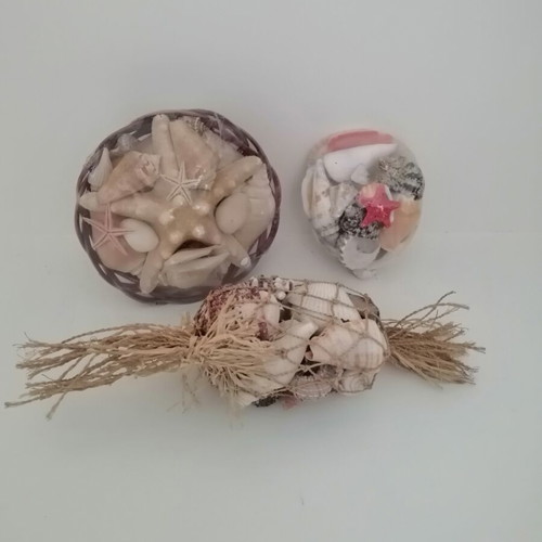 Decorative seashells set with bamboo basket and natural shells