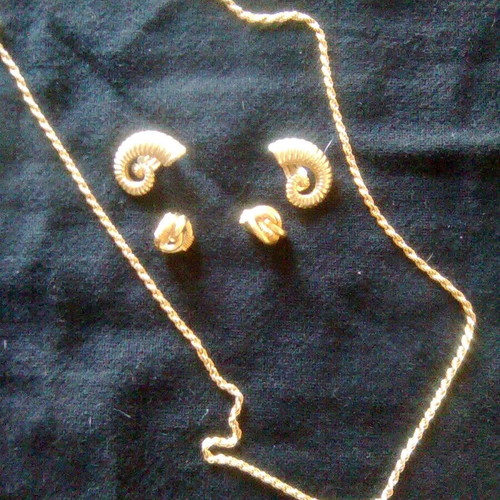 Necklace and earrings like new gold-colored