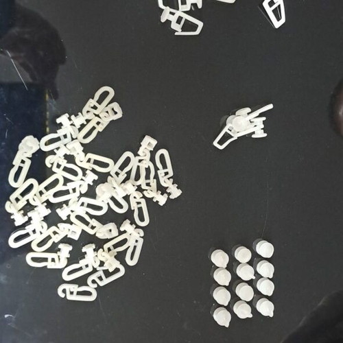 Plastic curtain hooks like new