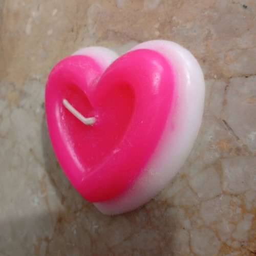 Handmade heart-shaped candle