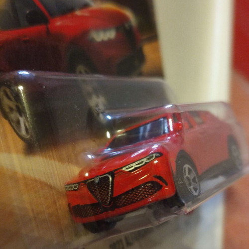 Alfa Romeo Tonale new 2023 model, red toy car