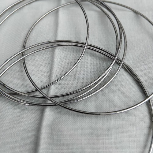 Bracelet of 7 Days with 7 braided rings silver color like new