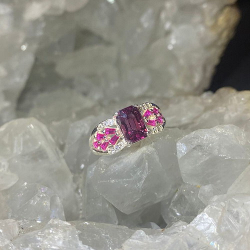 Silver ring with natural rhodolite garnet and moissanite