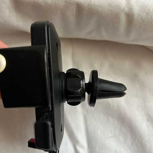 Car phone holder like new, air vent mount