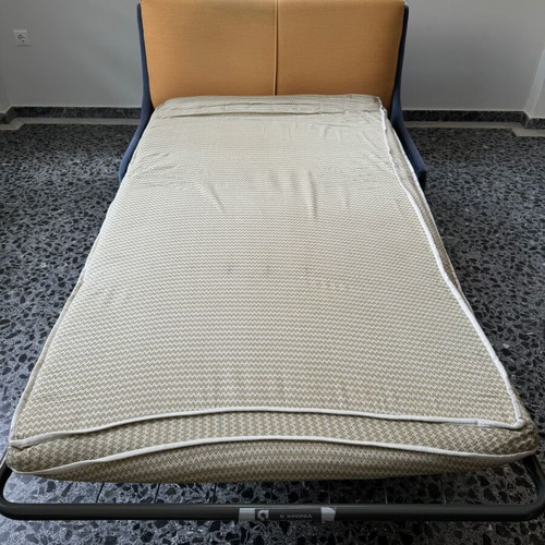 Two-seater sofa bed used
