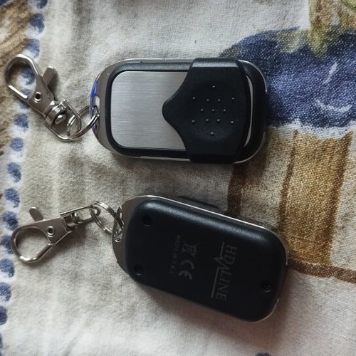 Garage door remote new, single piece
