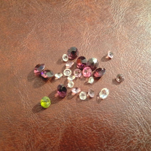 Semi-precious and precious stones like new, set of 23, round cut