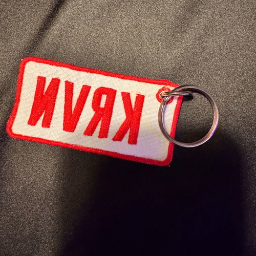 Keychain Caravan embroidered like new, white and gold