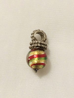 Murano pendant used with glass, gold leaf, and silver base