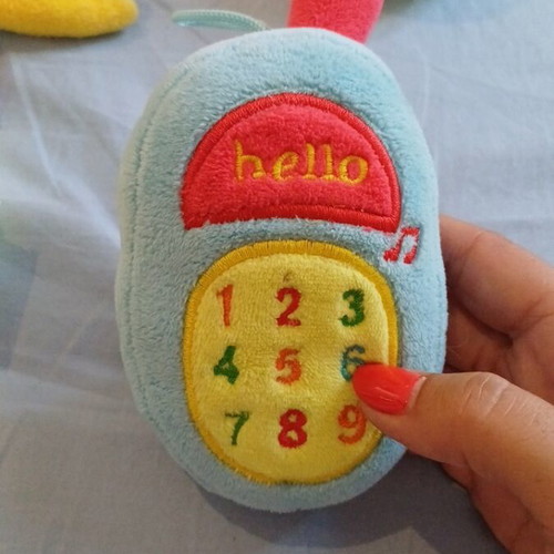Set of 5 baby toys with octopus, ball, duck, rattle, chicken, and phone