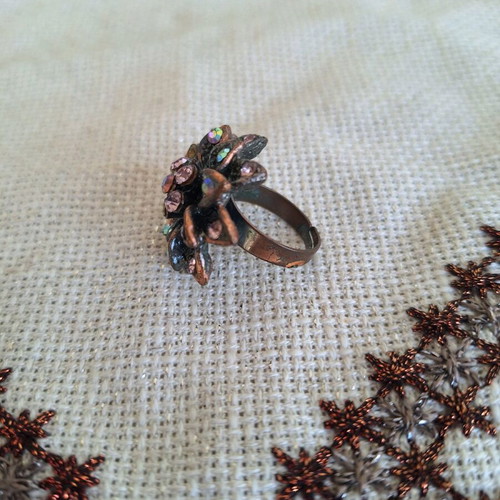 Bronze flower ring with pink rhinestones used