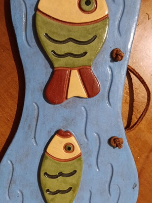 Ceramic decorative wall art with two fish like new