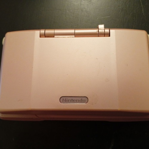 Nintendo DS console Metallic Rose used for repair or parts