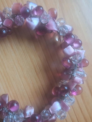 Bracelet with pink stones used, adjustable to wrist