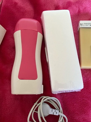 Lker hair removal wax warmer used with wax and strips included