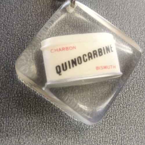 Vintage keychain like new with metal Quinocarbine pharmaceutical box